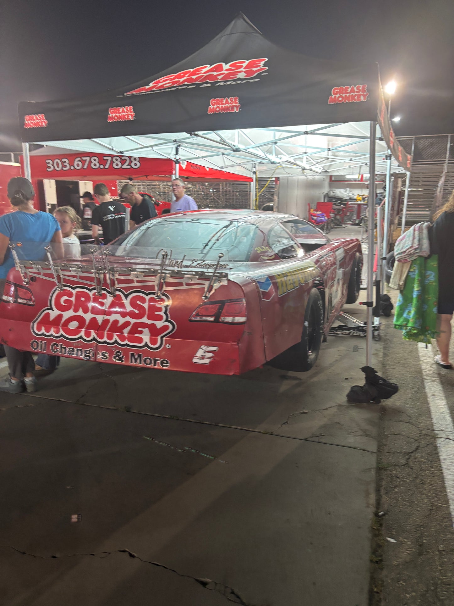 Grease Monkey Oil Change Logo displayed with Canopy Pit Lights