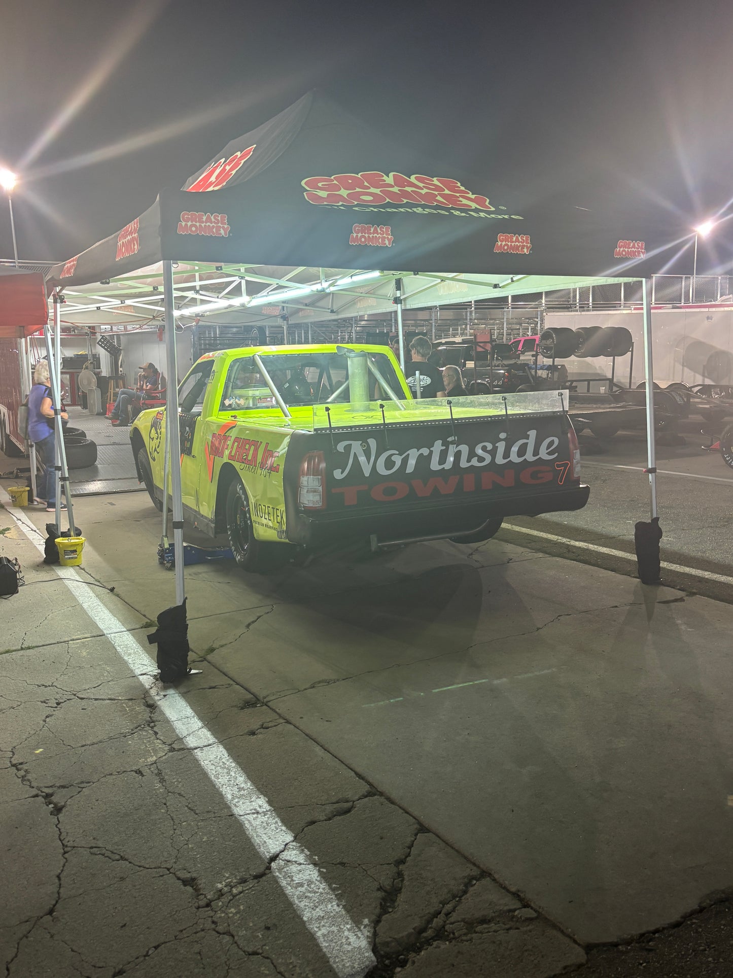Canopy Pit Lights illuminating sponsor logo
