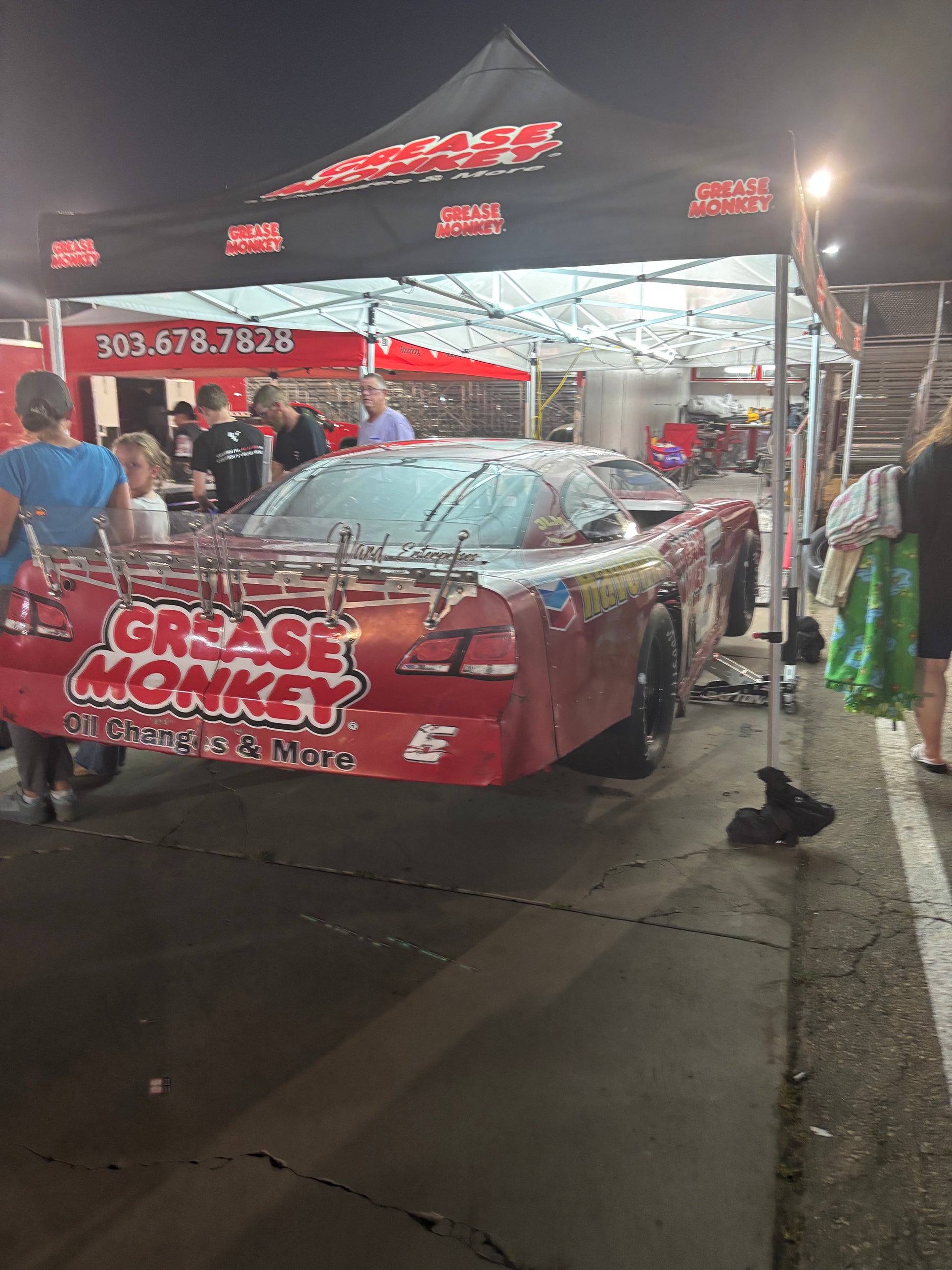 Grease Monkey Oil Change Logo displayed with Canopy Pit Lights